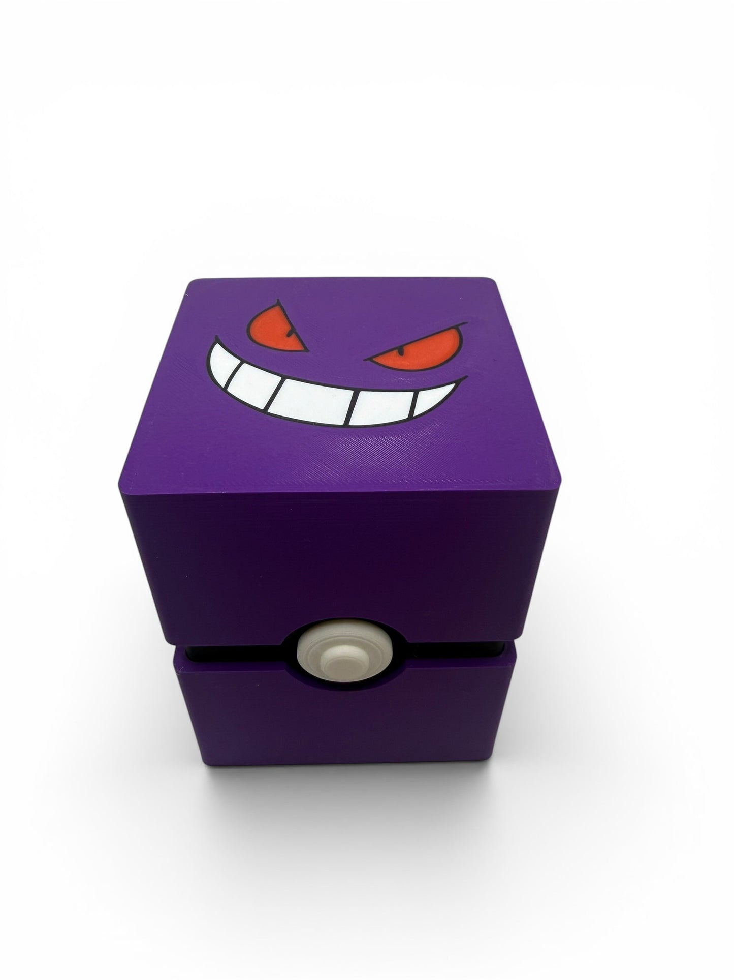 Handcrafted Pokémon character face design detail on custom deck box lid